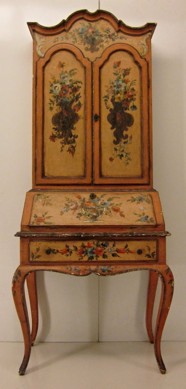 Venetian secretary with original hand painted finish and lovely floral design. Opening to 26