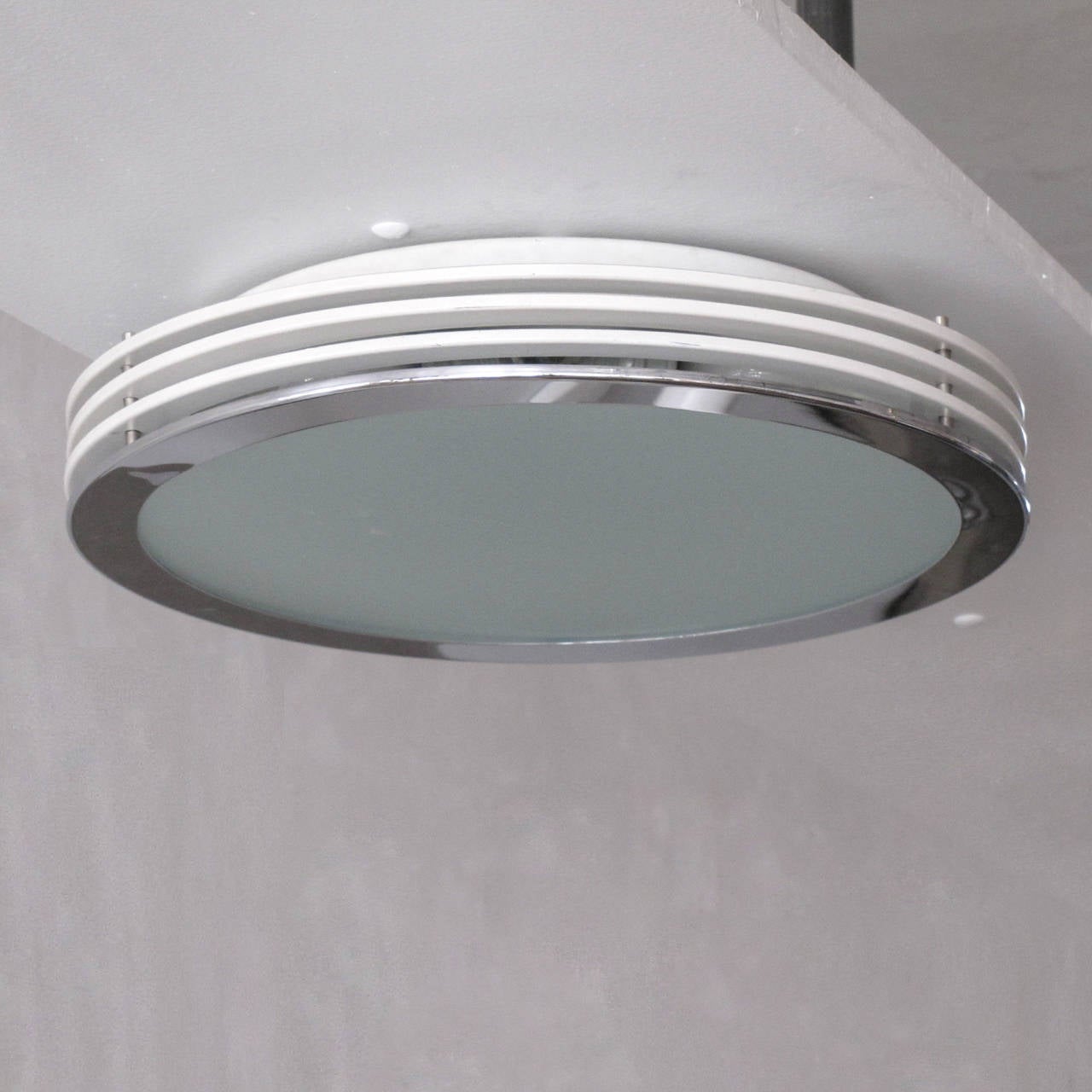 Elegant, frosted glass ceiling mounted light by Doria Leuchten Germany with chrome-plated and white enameled layered rings.