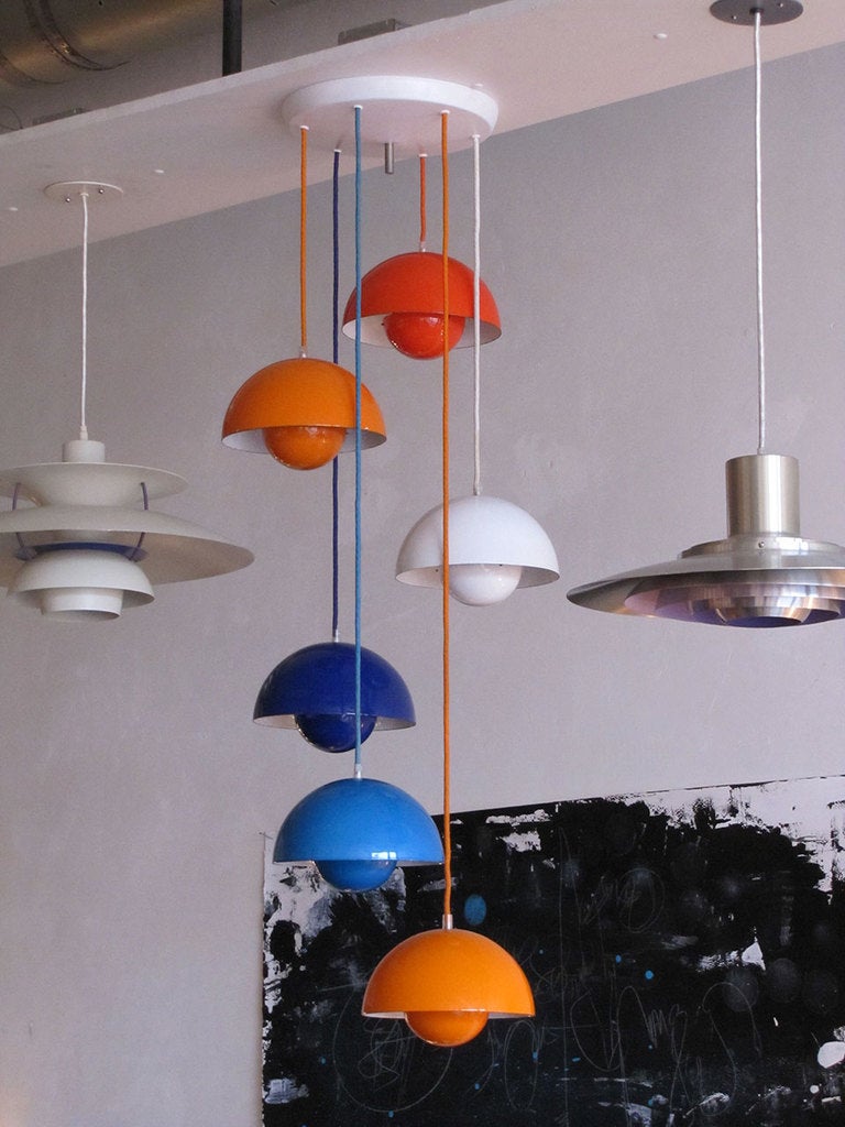 wonderful 1970's Flower Pot hanging lights by Verner Panton for Louis Poulsen, six pieces in five colors with original colored cords, insides of the reflector spheres is orange, heights are adjustable marked, sold individually @ $1100 or as a set @