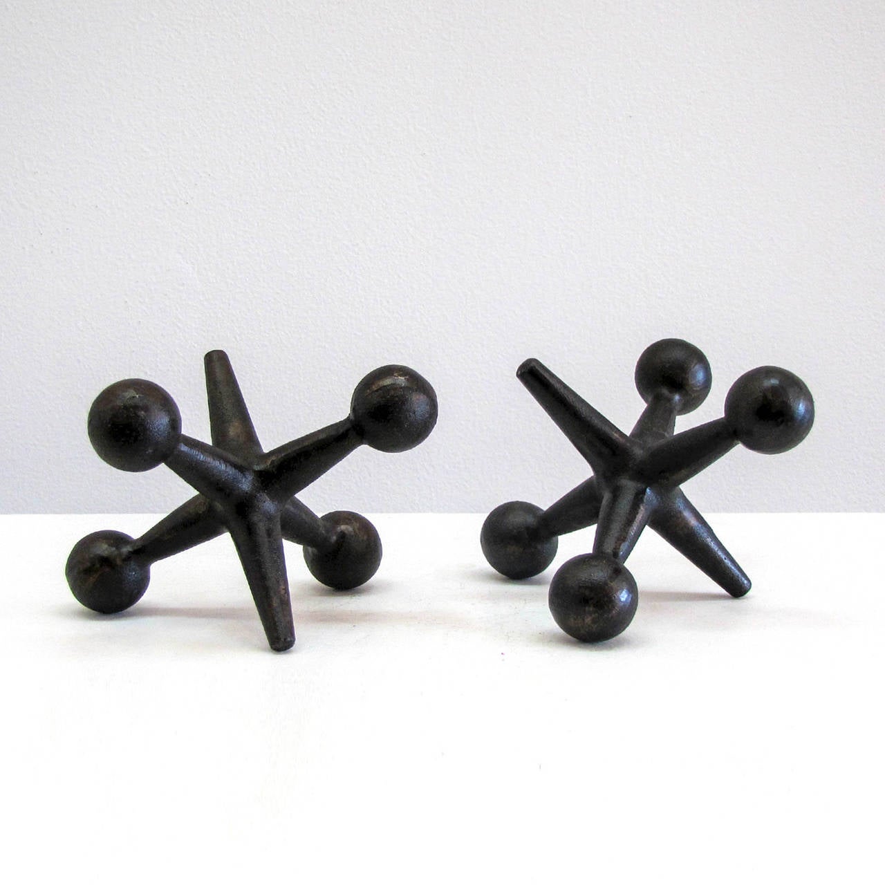 Mid-20th Century Cast Iron Jacks by Bill Curry