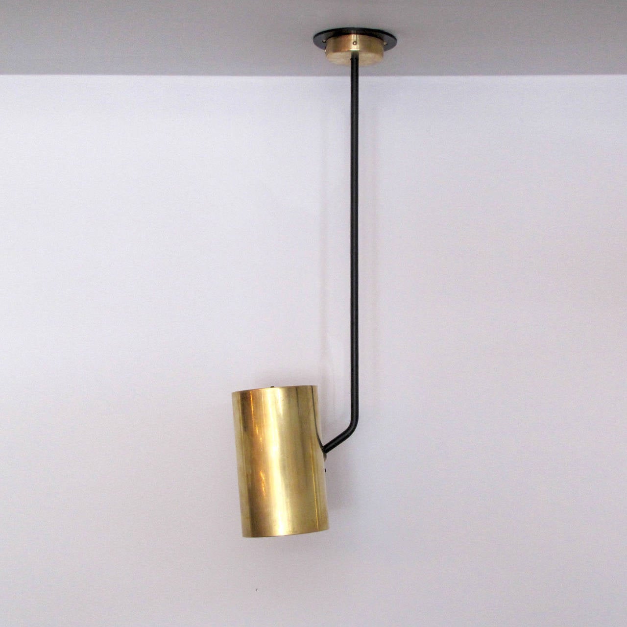 Great pair of understated French ceiling lights by Parscot, long stem pendants with adjustable brass cylinders, can be used as wall lights, priced as a pair.