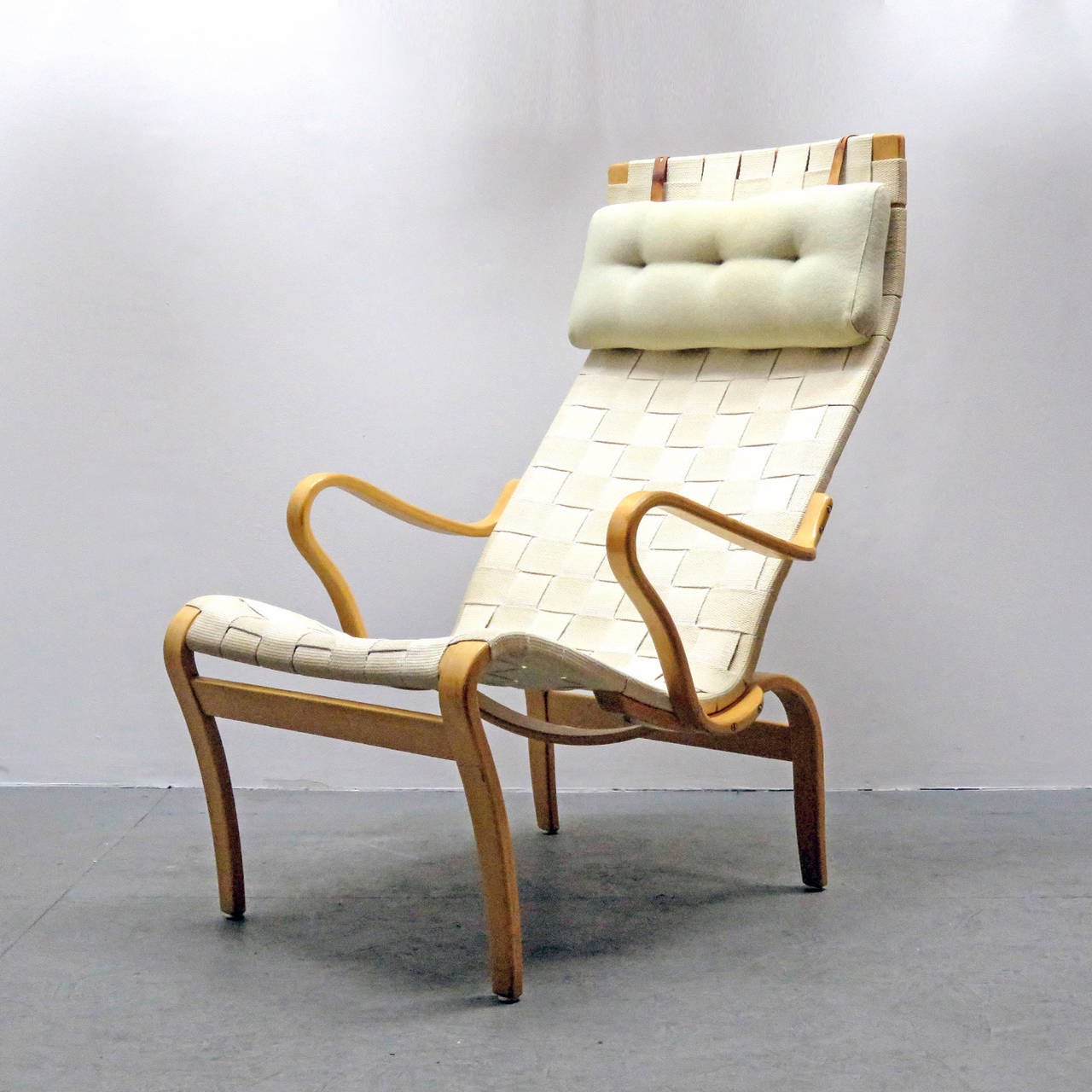 Swedish Two Miranda Lounge Chairs and Ottoman by Bruno Mathsson