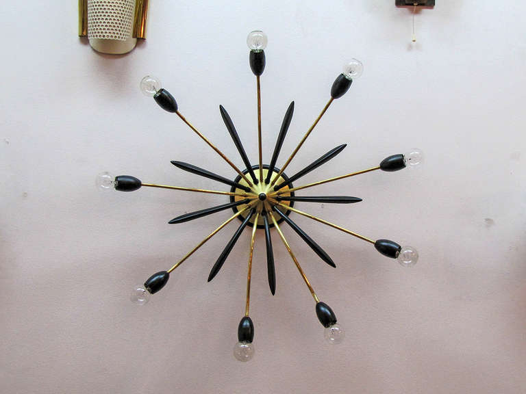 wonderful large German nine arm sputnik in brass and enameled metal, can be used as wall or ceiling flush mount fixture