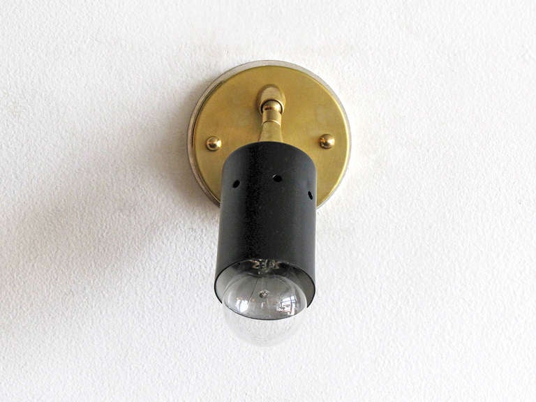 pair of petite articulate Italian wall sconces by Stilux with individual on/off switches