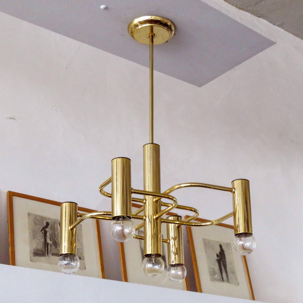 stunning geometric 5 light brass chandelier by Boulanger