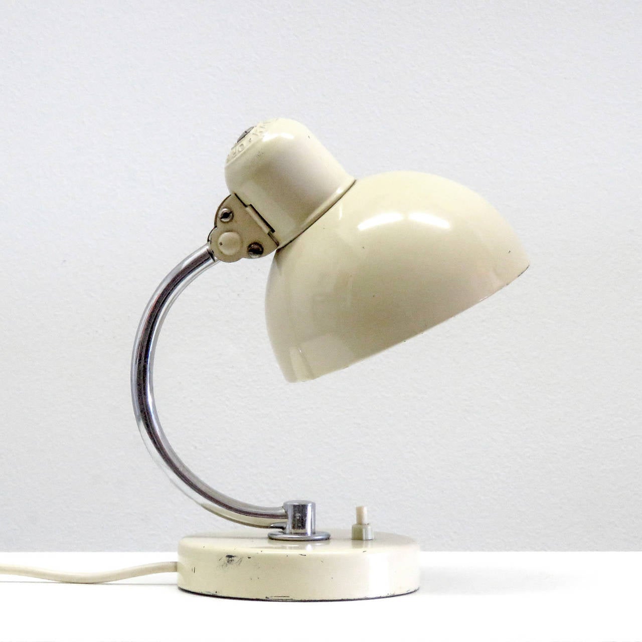 wonderful small bedside table lamp model 6722 or "Baby Kaiser", designed in 1933 by Christian Dell, marked
