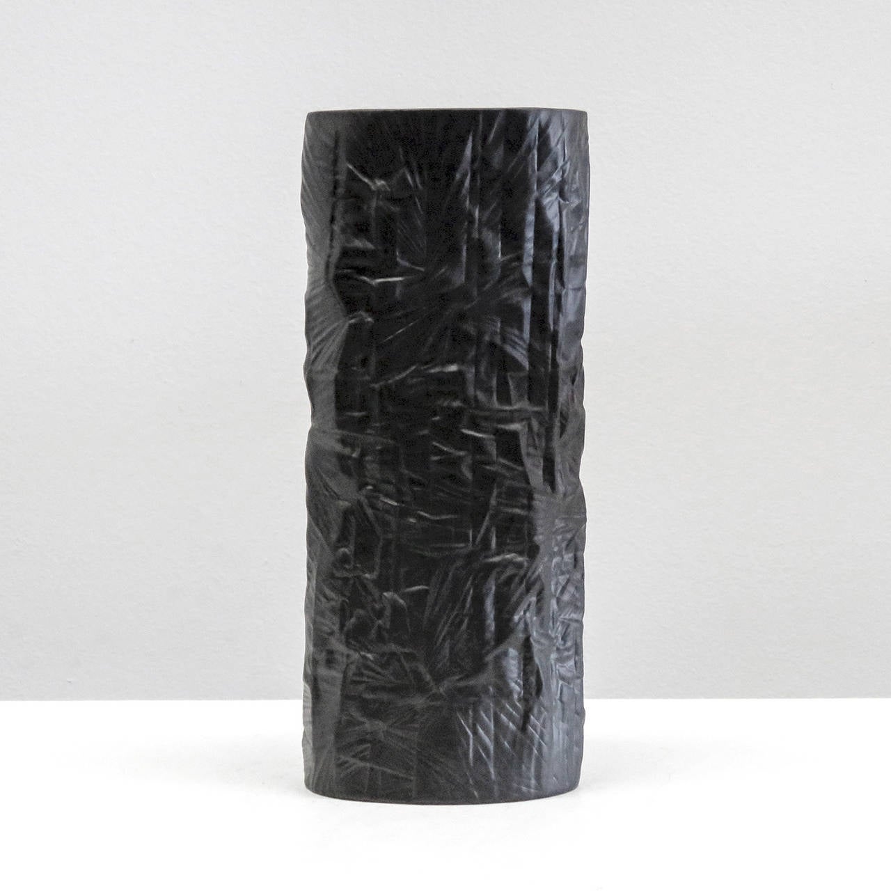 Stunning, tall, elliptical black porcelain vase by Martin Freyer for Rosenthal, Germany, with topographical pattern, marked.
