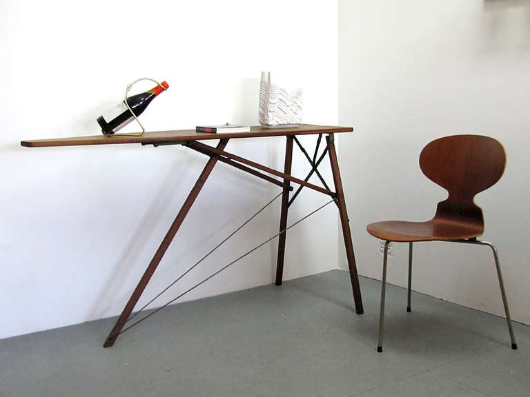 vintage wooden ironing board with metal hardware, multiple use as sideboard/serving board possible, great industrial detailing, folds flat