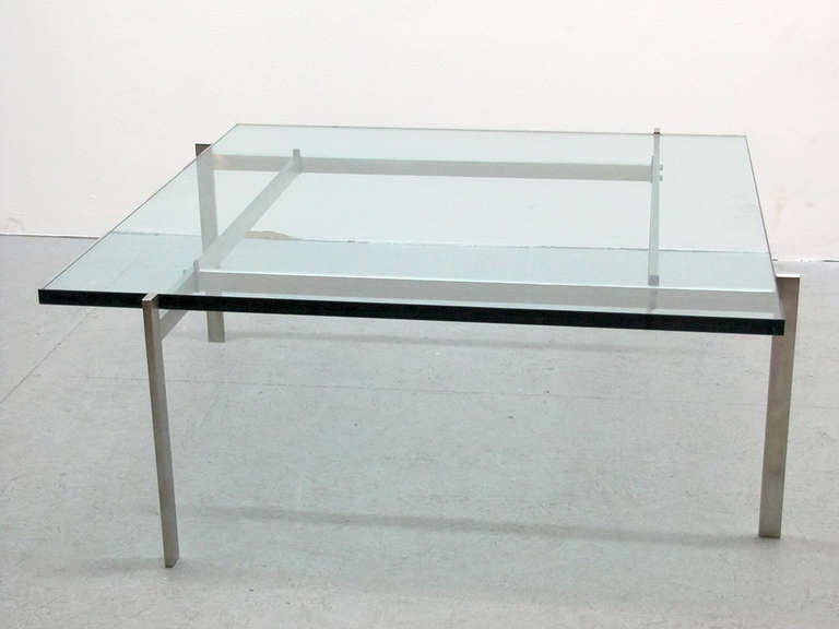 stunning PK-61 coffee table designed by Poul Kjærholm in 1956, original glass top on satin brushed steel, marked Fritz Hansen
