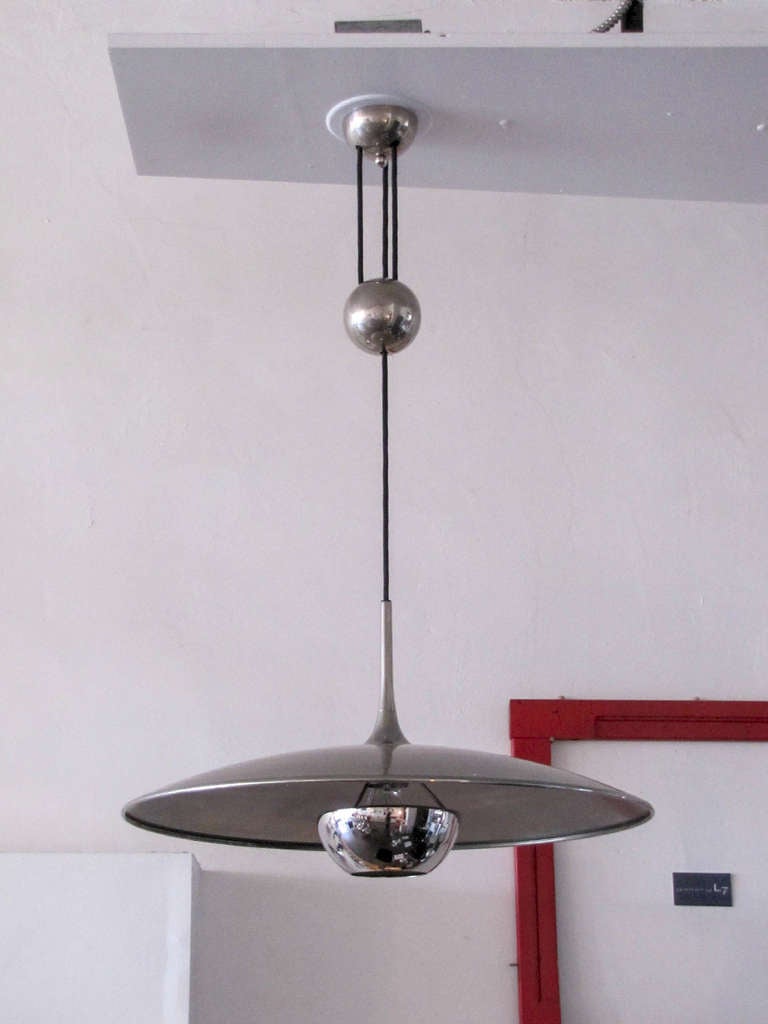 large nickel plated saucer pendant by Florian Schulz, with central pulley mechanism, a HEAVY nickel plated ball counter balances the weight of the fully adjustable shade