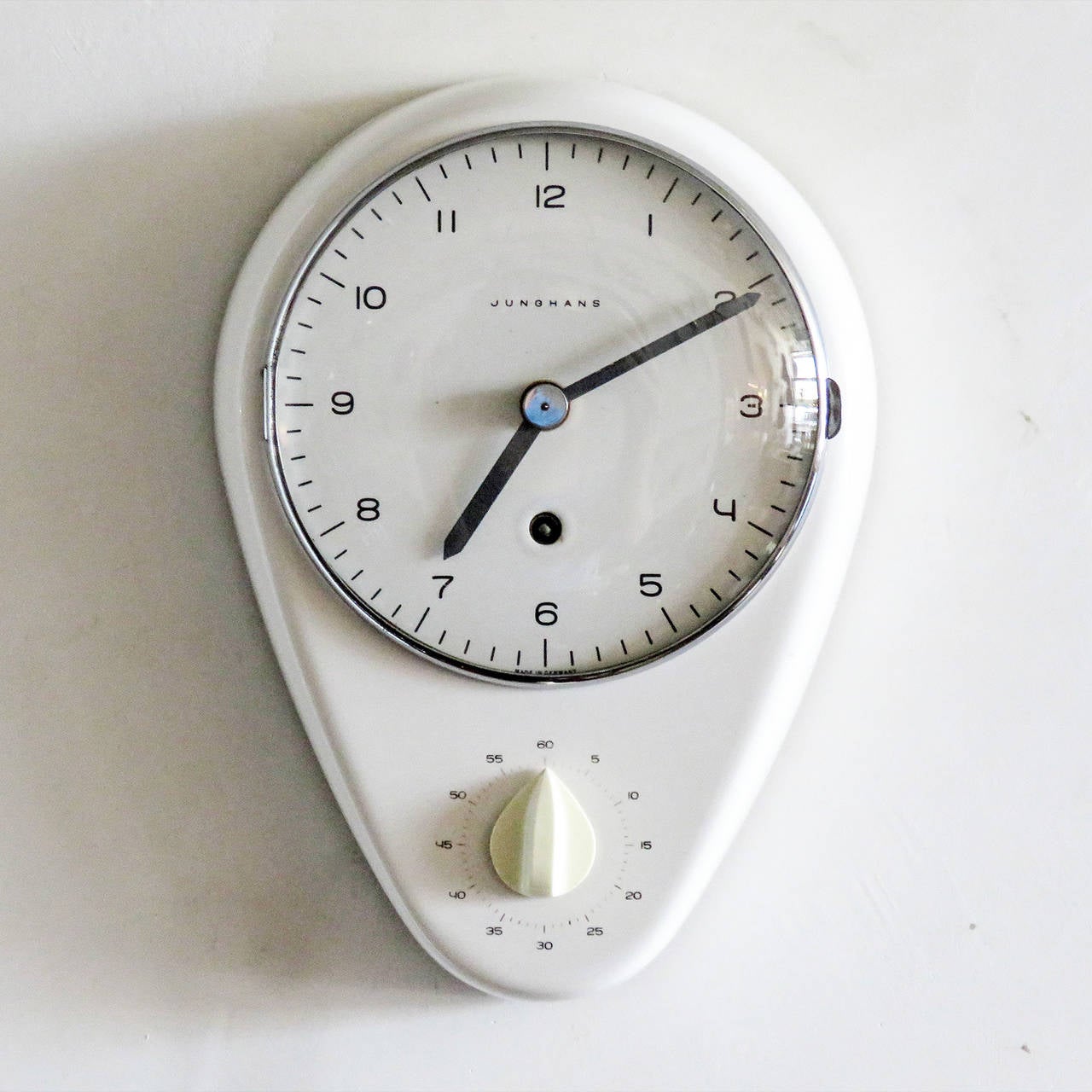 Iconic wall clock and timer by Max Bill for Junghans Germany, 1954, with chrome framed removable glass cover, signed with printed manufacturer's mark to face and impressed manufacturer's mark to reverse: [RD Eng Nr. 886824].