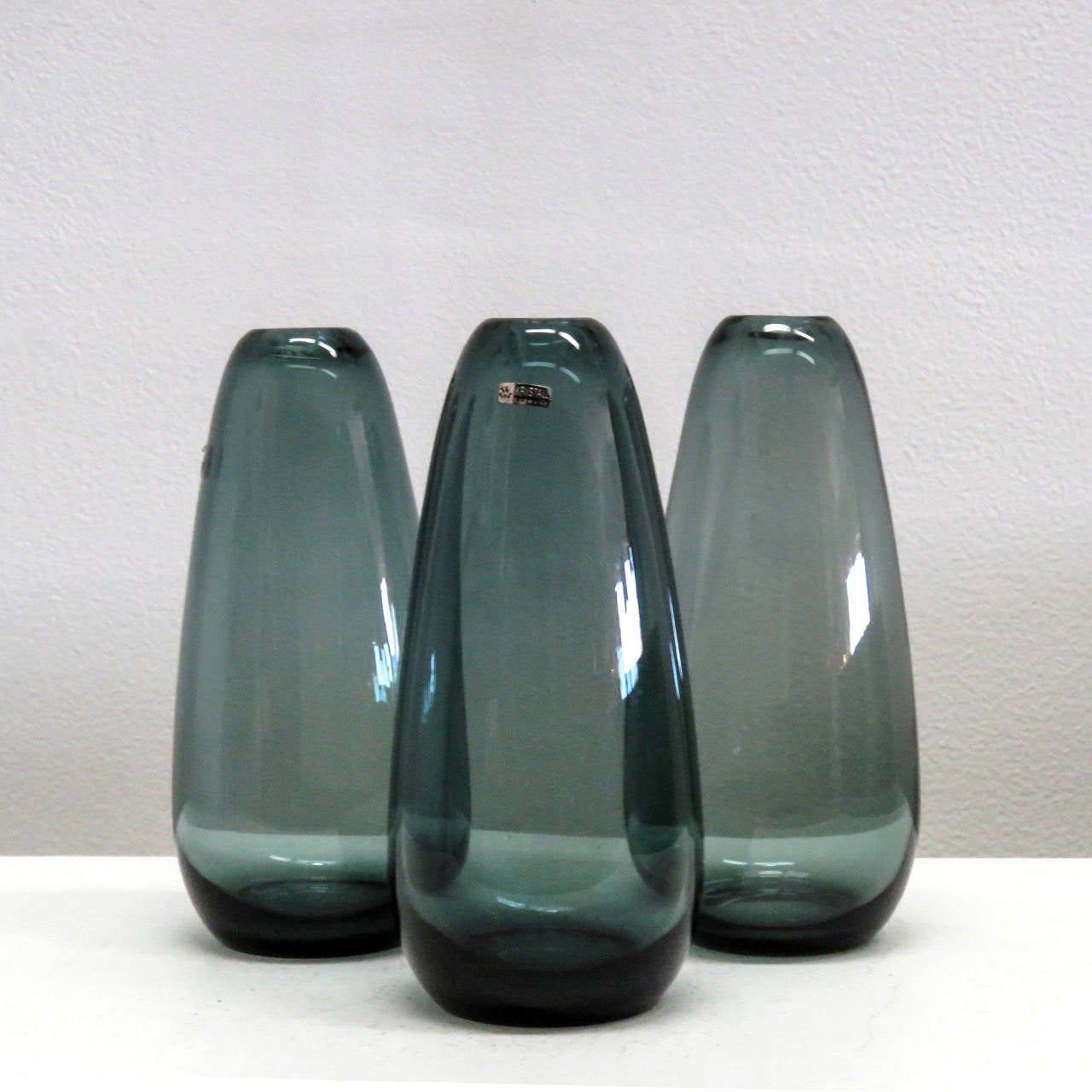 Elegant WMF "Turmalin" series by Wilhelm Wagenfeld, blown and cold cut-glass vases, marked.