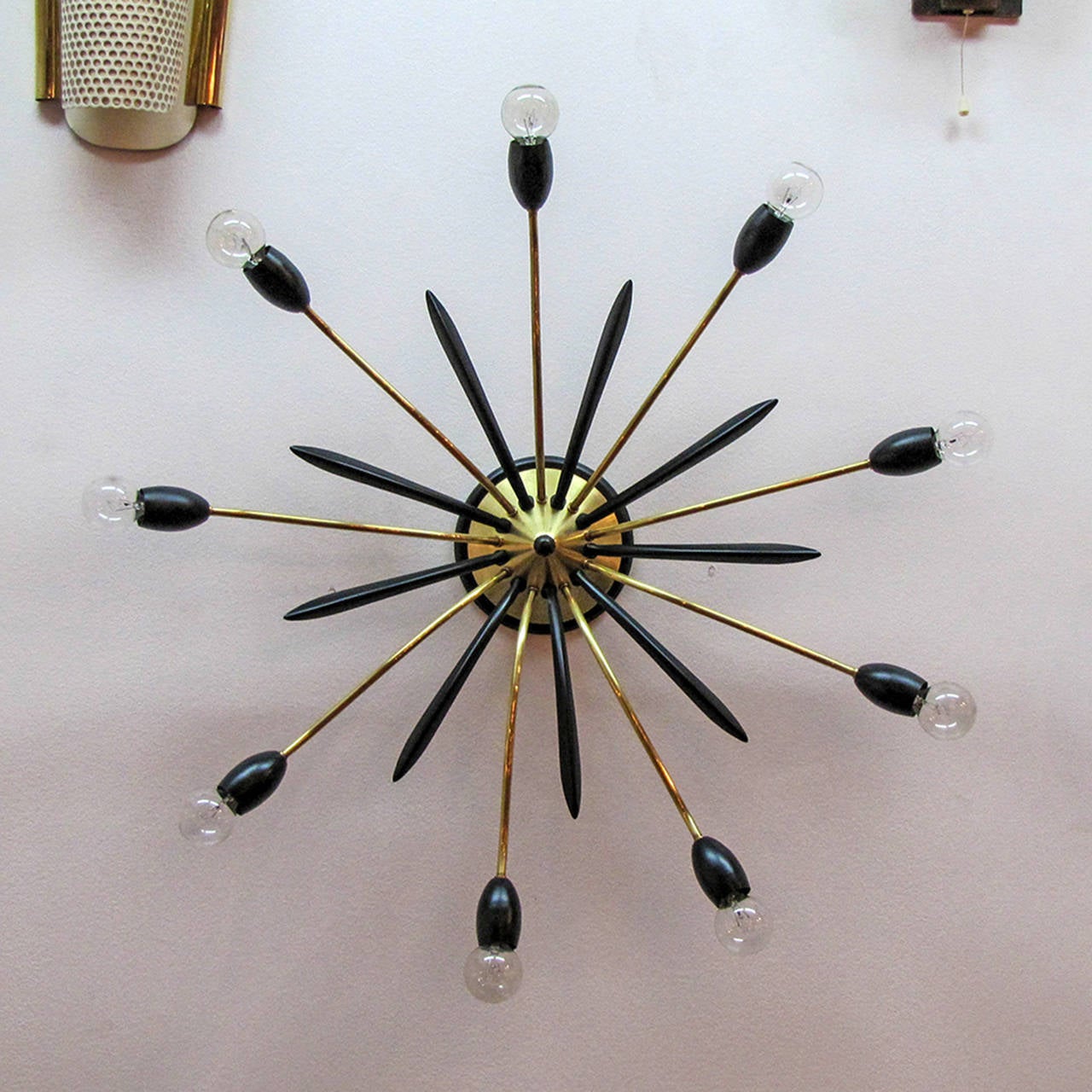 Wonderful large German nine-arm Sputnik in brass and enameled metal, can be used as wall or ceiling flush mount fixture.