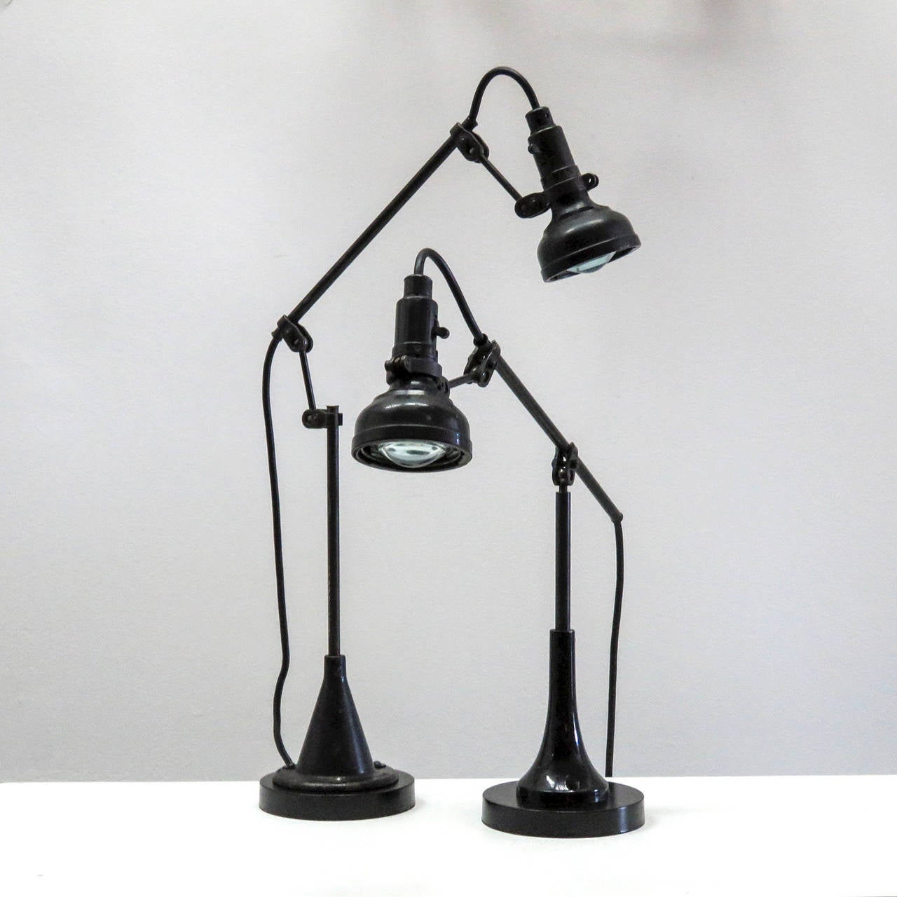 wonderful sewing task lights with original lenses and custom table lamp bases, can alternately be bolted to a table or wall, marked