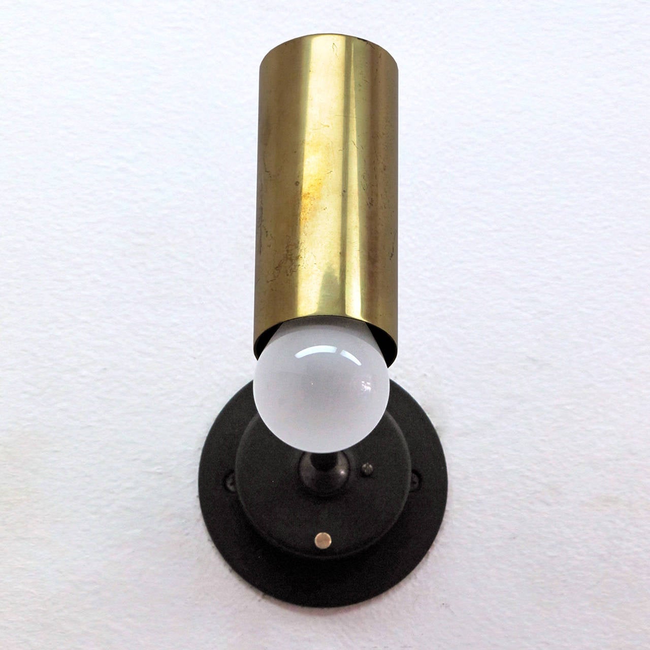 Elegant brass bodied adjustable sconces, swivel joint at the cylinders, ball joint at the backplate, circle of perforations at top of cylinders, shade extensions available (pic 4&9), custom back plates for US electrical use.