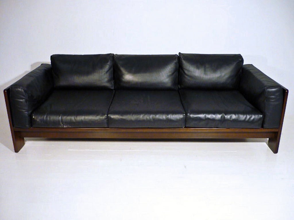 Sleek rosewood and black leather Bastiano 3-seater sofa <br />
by Tobia Scarpa for Gavina.