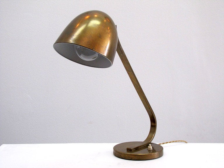 wonderful large brass table lamp by Vilhelm Lauritzen
adjustable hood, on/off switch at the base