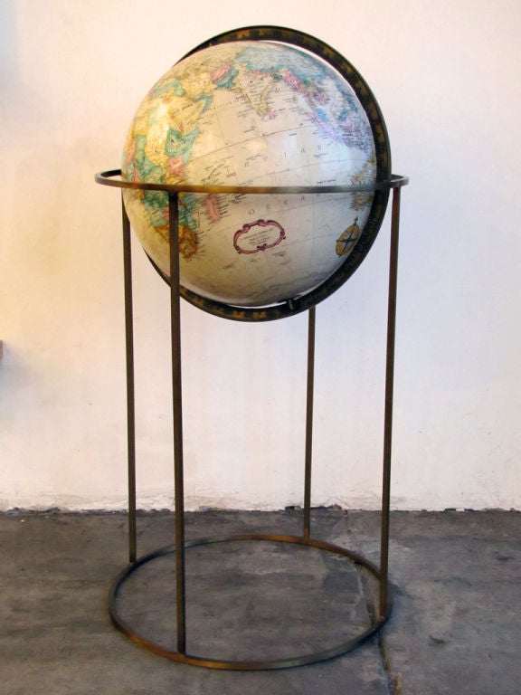 wonderful late 1960's floor standing globe <br />
on a minimal open form bronze square tubing frame.<br />
globe: 19