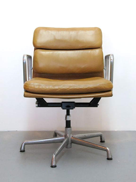early honey colored leather Charles Eames for Herman Miller<br />
soft pad desk chair, height adjustable, swivel and tilt limiter <br />
early large sized height adjustment knob and 5 star base