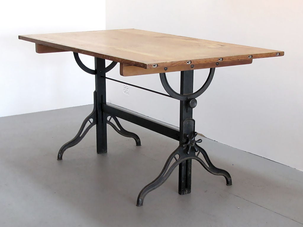 iron and wood dining table<br />
adjustable as large architectural desk