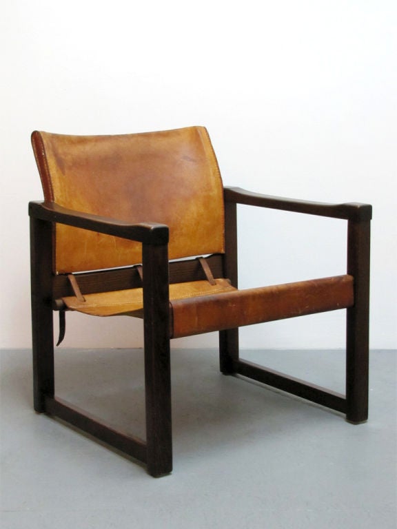 beautiful aged wood frame with leather seat by Martin Visser