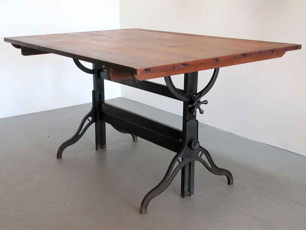 large iron and wood dining table<br />
adjustable as large architectural desk