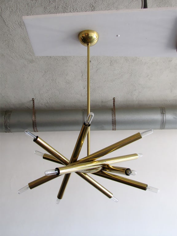 stunning six arm, 12 bulb brass chandelier by Stilnovo