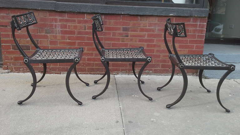 A set of six heavy cast aluminum high quality iconic Klismos chairs in a dark bronze finish with white highlights. Can be used inside or outside.
We are always adding to our 1st dibs inventory so be sure to include.
Us on your favorite dealer list