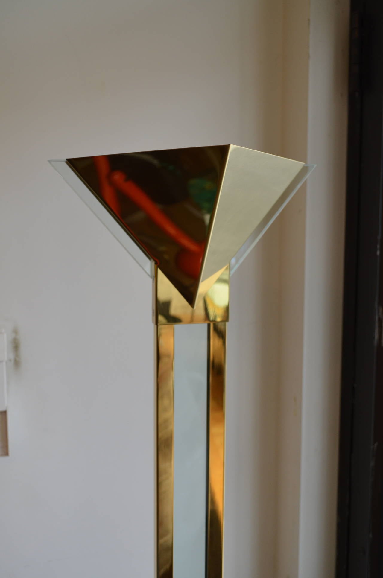 A sculptural brass and Lucite torchiere by Robert Sonneman
for George Kovacs.