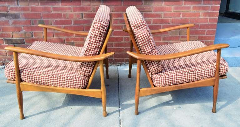 A pair of sculptural Mid-Century Italian Arm Chairs. The chairs have been reupholstered in classic Knoll houndstooth fabric.