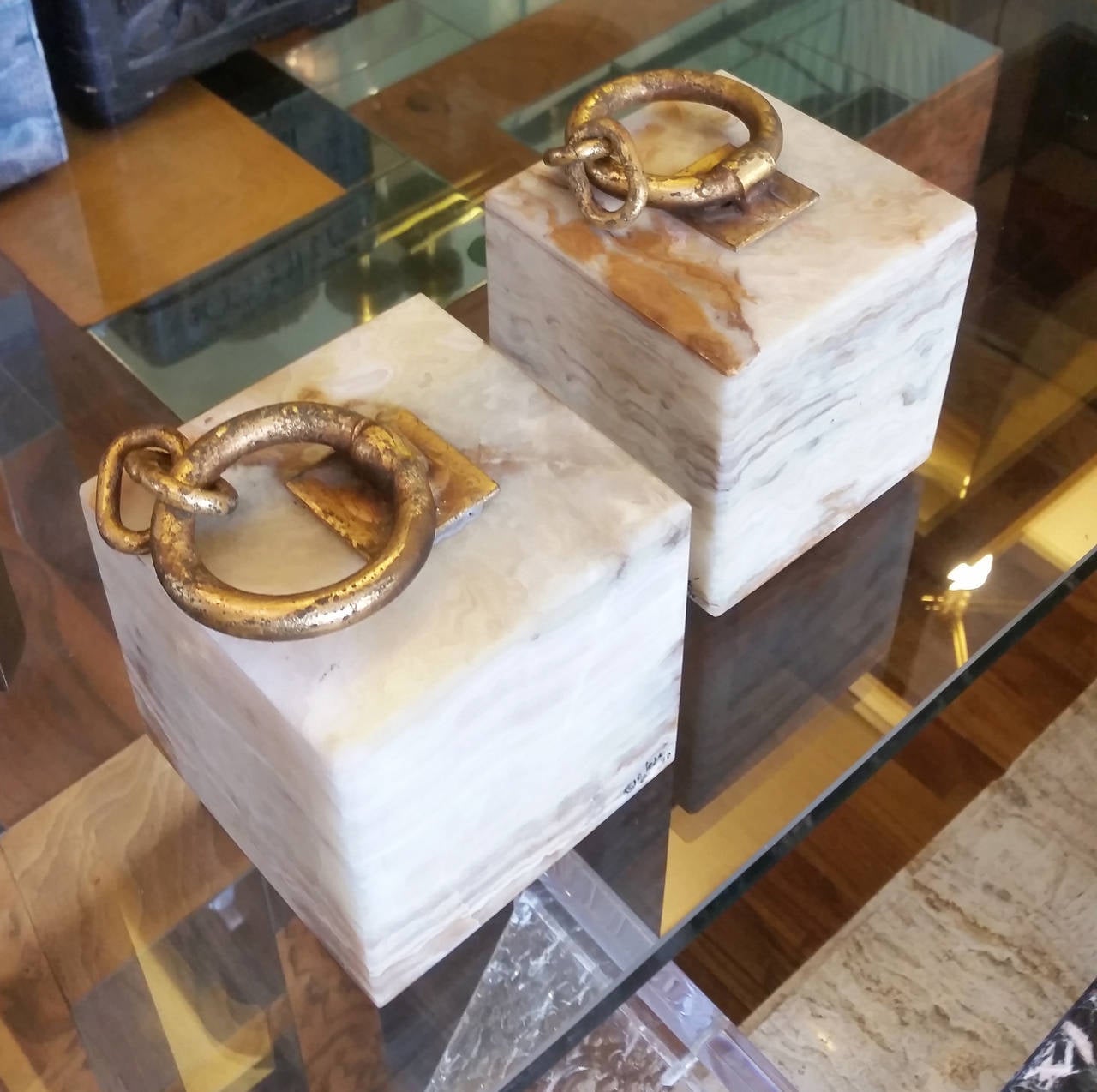 A handsome pair of onyx and gilt metal bookends by Curtis Jere.