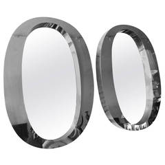 Pair of One of a Kind Modern Oval Stainless Steel Mirrors