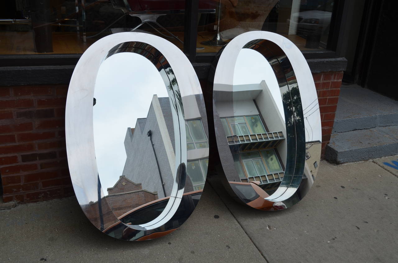 American Pair of One of a Kind Modern Oval Stainless Steel Mirrors For Sale