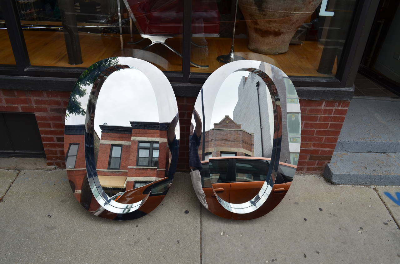 Originally these huge, vintage, chrome mid century pieces were the address on the lobby of a prominent Chicago Wacker drive skyscraper.Beautiful large rare pieces.
We had custom mirrors installed. Great large scale mirrors.
Please call us for a