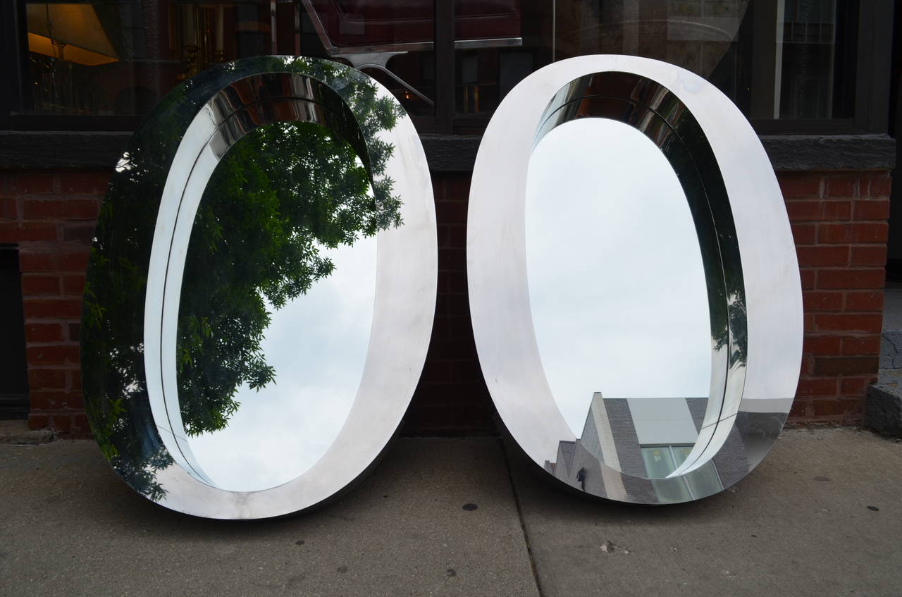 Pair of One of a Kind Modern Oval Stainless Steel Mirrors In Good Condition For Sale In Chicago, IL