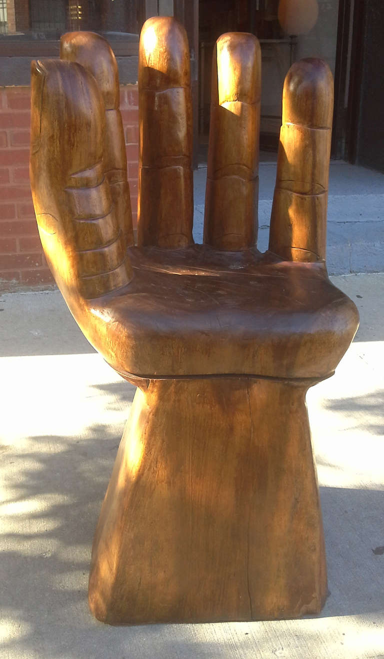 A whimsical carved wood chair in the manner of Pedro Friedeberg. Great carving highlights the hands nails and wrinkles to the fingers and palm.
We are always adding to our 1st dibs inventory so be sure to include
us on your favorite dealer list