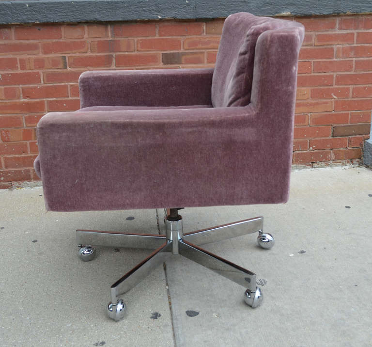 A mohair executive swivel arm chair on chrome casters manufactured by De Sede, Switzerland.