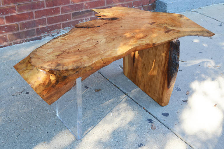 Stunning conoid style live edge coffee table reminiscent of the designs of George Nakashima.

Its unique wood and Lucite combination features two butterfly tenons on the top and two on the wood base. 

Very good condition.