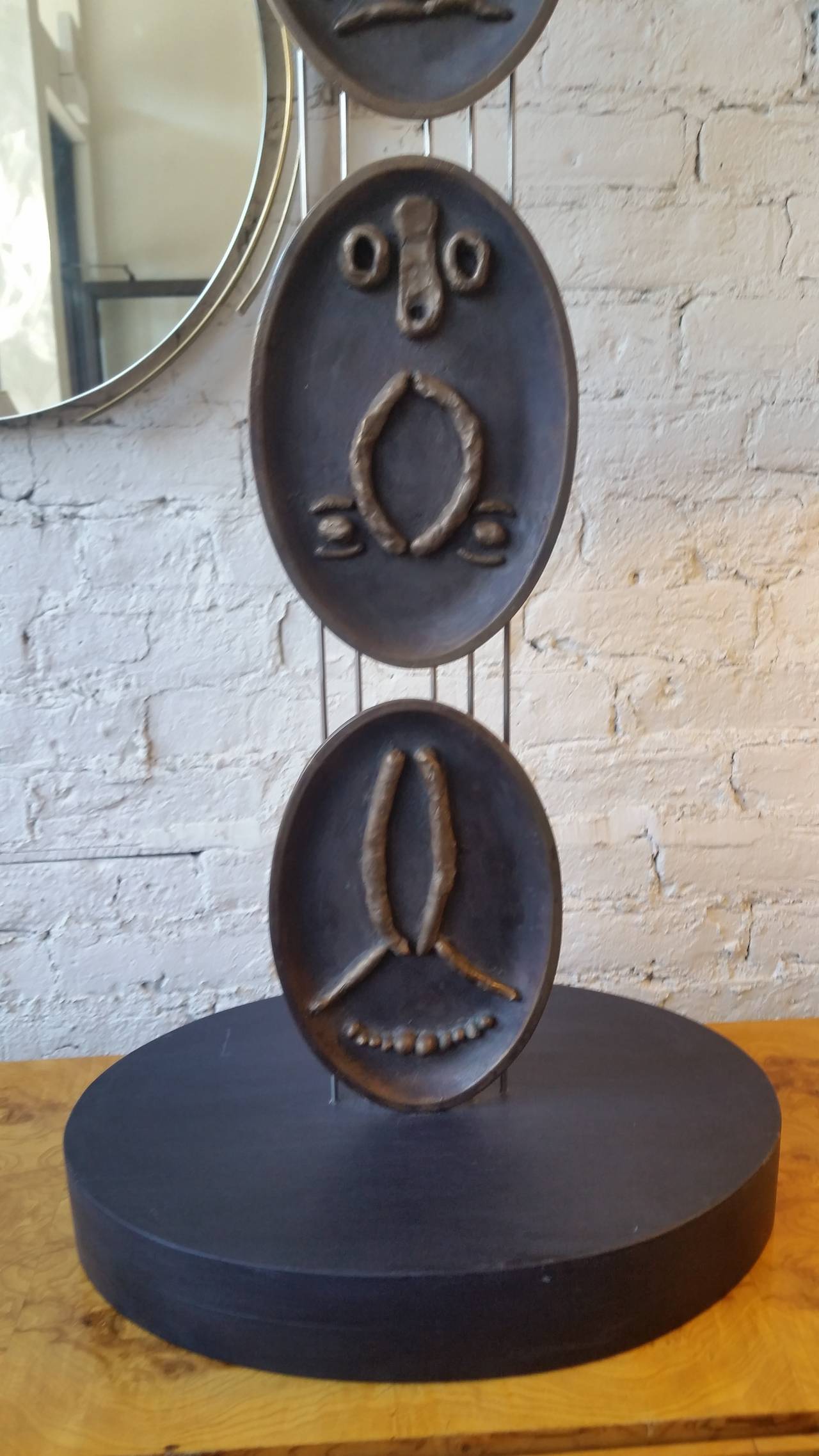 A bronze four panel Picasso Style Totem by
noted sculptor Richard Light. Signed 1 of 4
2014. Light from Kalamazoo, Michigan is a graduate
of Yale University, The Art Institute of Chicago
and Ecole des Beaux Arts IN Paris.
His work is included in