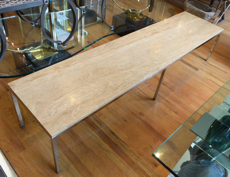 A monumental seven foot long  bench custom made for the
Executive Offices of the Schwinn Bicycle Company's Chicago headquarters.
This versatile Italian Travertine and steel bench would also
be wonderful as a coffee table.
