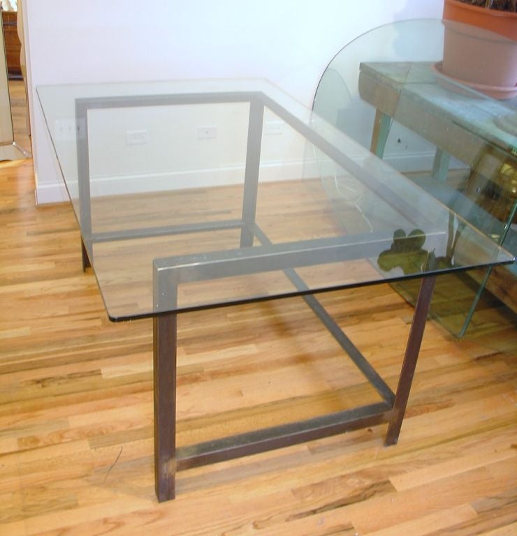 An industrial metal table or desk with glass top.
We are always adding to our 1st dibs inventory so be sure to include
us on your favorite dealer list and visit our storefront regularly.