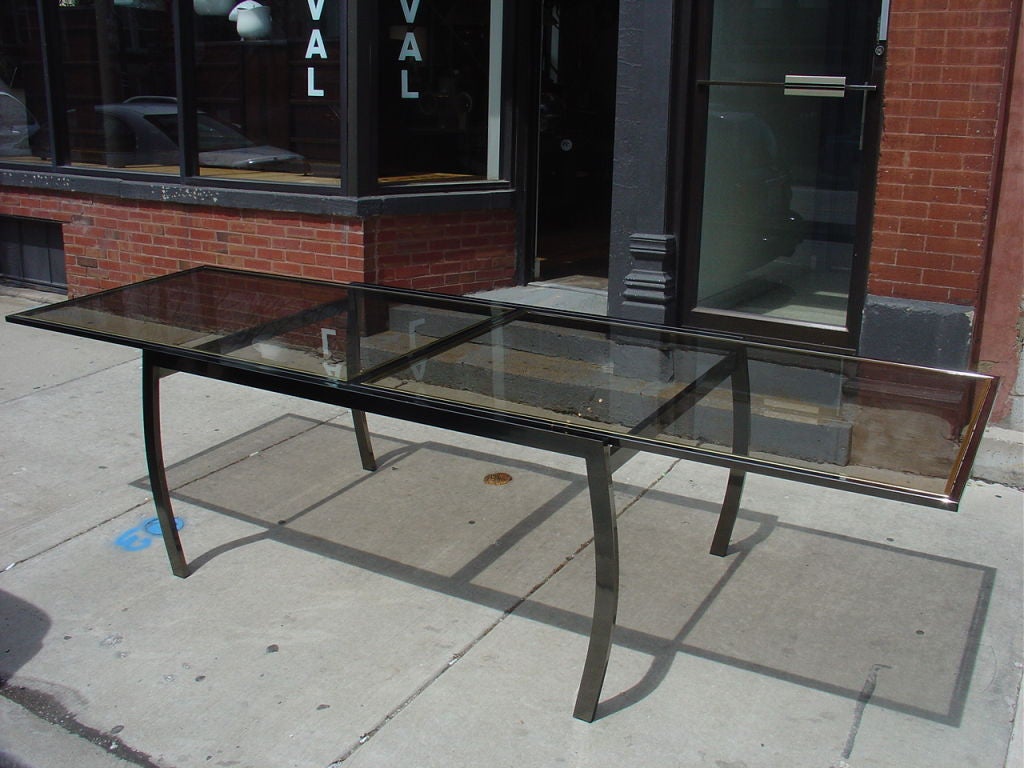 Design Institute of America Glass and Gunmetal Milo Baughman Style Dining Table In Good Condition In Chicago, IL