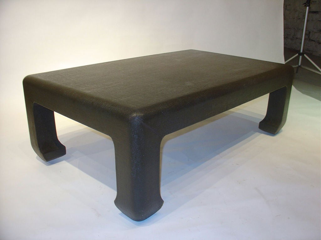 A 1970's linen wrapped Asian inspired coffee table.
