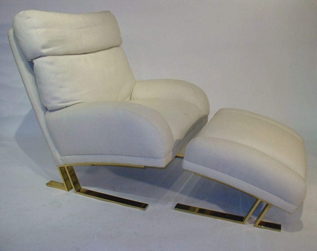 A brass base Directional Lounge Chair and Ottoman by Milo Baughman. The ottoman is 15 inches high and is 29x24.