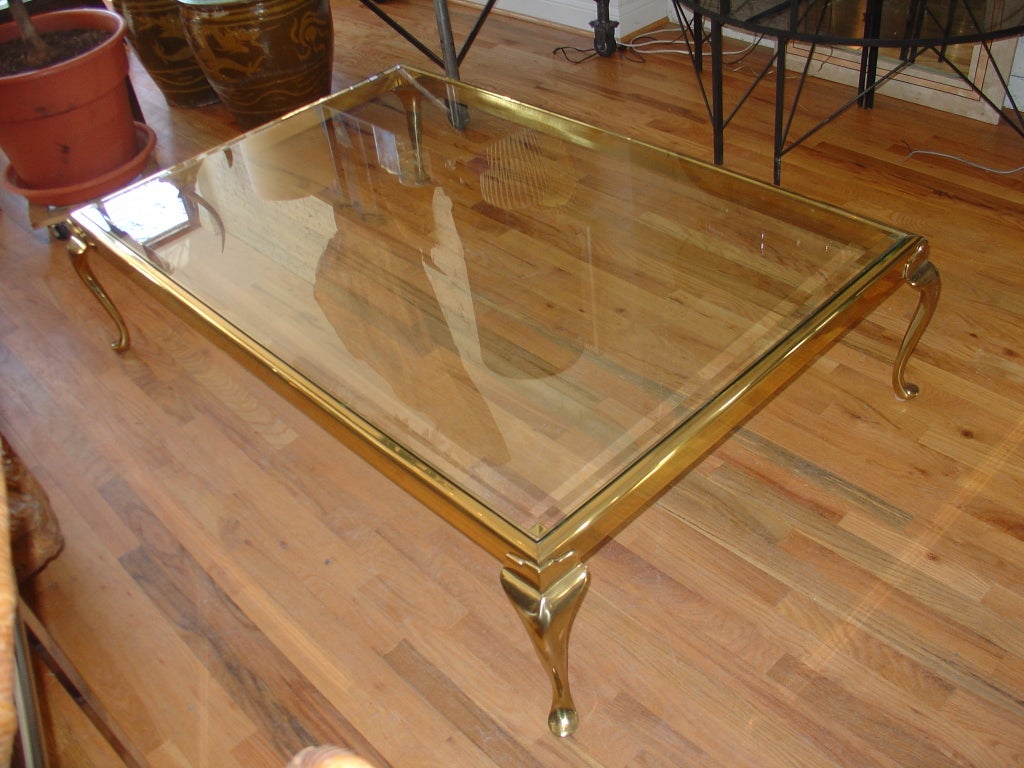 An Exceptionally Large Brass and Glass Coffee Table