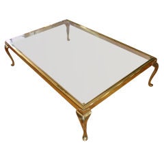 An Exceptionally Large Brass and Glass Coffee Table