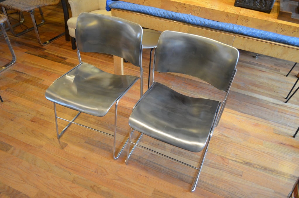 40/4 stacking chairs designed by David Rowland for Goodform. The chairs have chrome frames with newly polished steel seats and backs.Multiple available.Priced individualy.