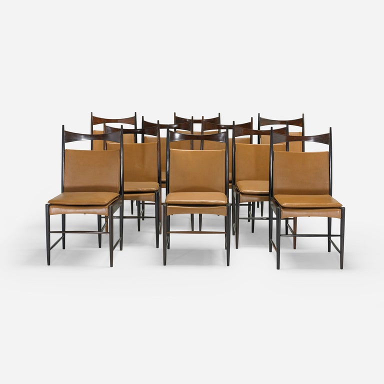 Signed with paper manufacturer's label to underside of eight examples: [No3111 Fabricado Pela Oca, Arquit Ind. E Comercio S.A.] Among Brazil's most prominent designers, Sergio Rodrigues was influential in developing the country’s distinctive design