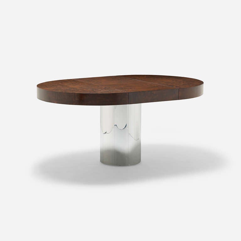 Sold with one 20-inch leaf; table measures 62.5 inches when fully extended.