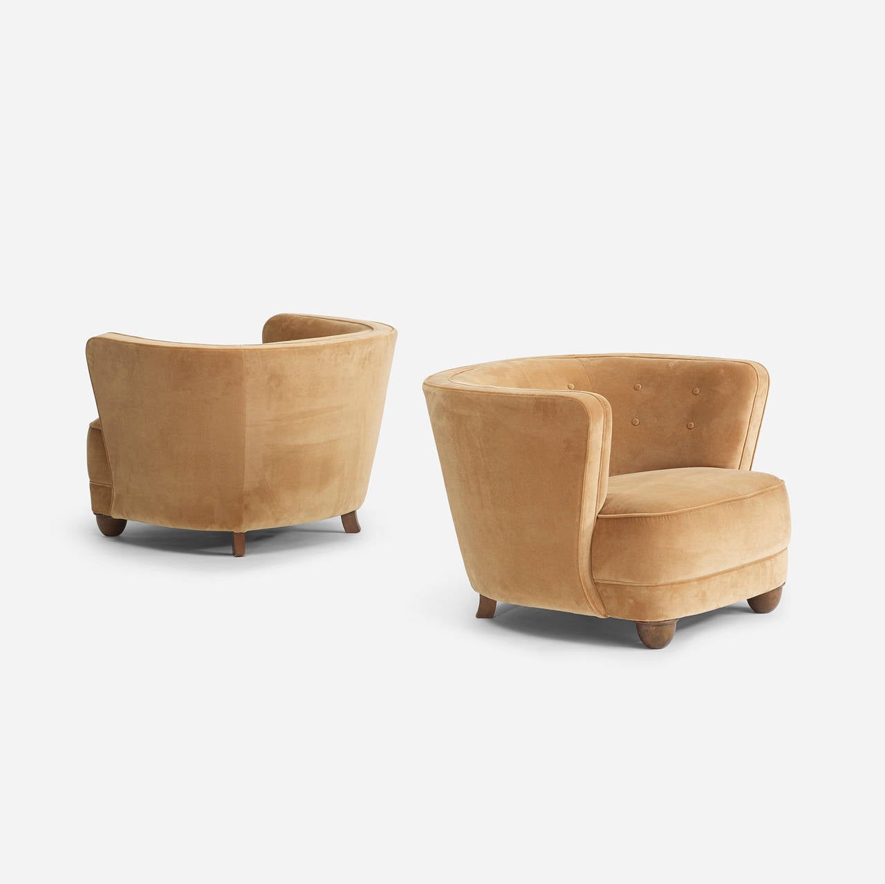 Pair of Danish cabinetmaker lounge chairs.